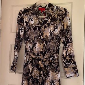 Jennifer Lopez snake skin print button up dress